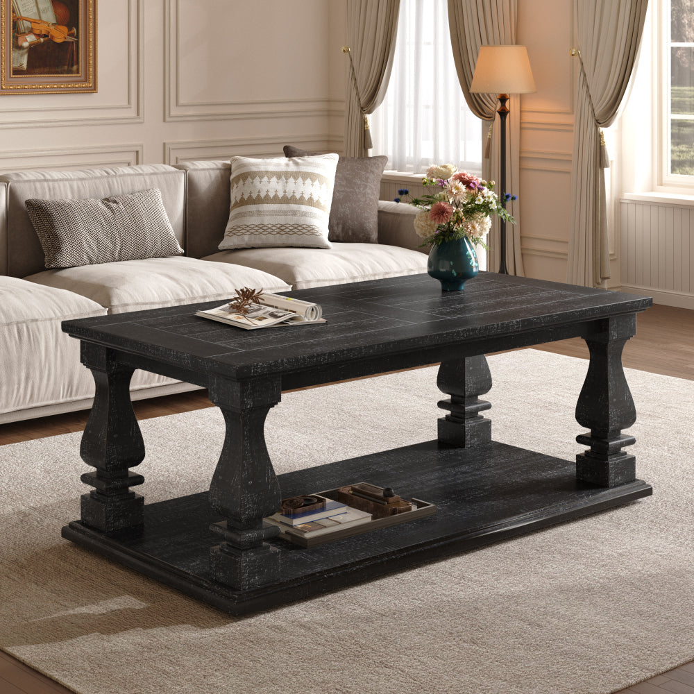 Dark wooden coffee table with turned legs, holding a vase of flowers and magazines, in a traditional living room.