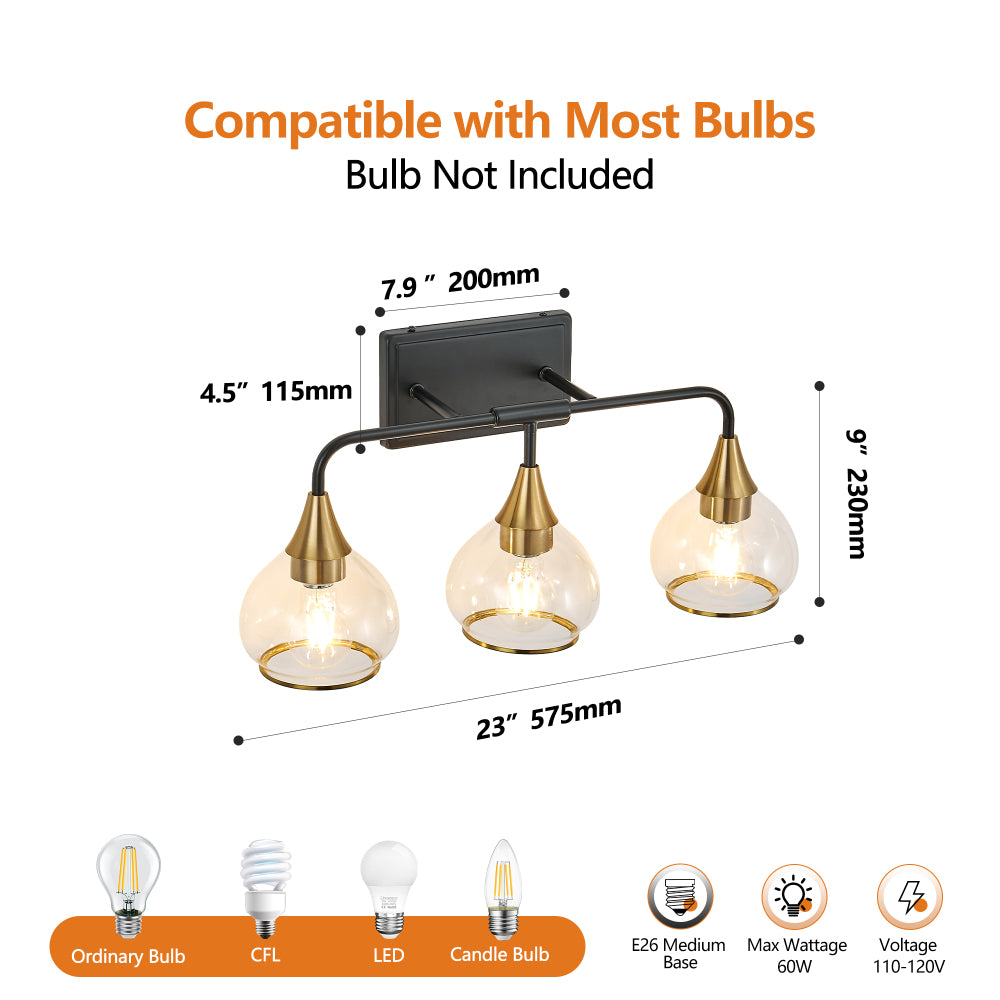 Black and gold 3-light vanity wall sconce with clear glass shades, dimensions 23" wide x 9" tall, compatible with E26 bulbs (not included).