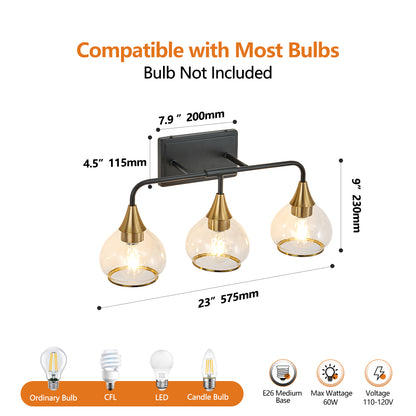 Black and gold 3-light vanity wall sconce with clear glass shades, dimensions 23" wide x 9" tall, compatible with E26 bulbs (not included).