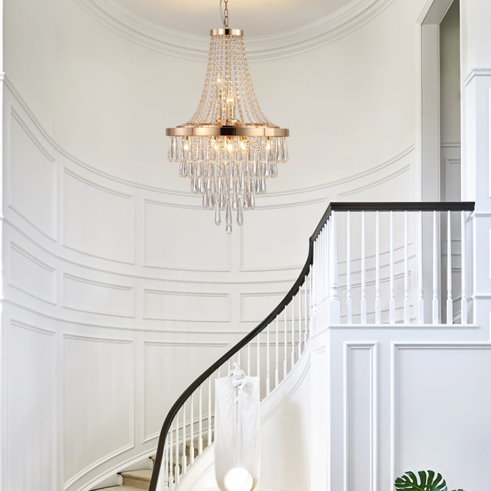 20-inch K9 crystal chandelier with gold finish, 11 lights, adjustable height 33-71 inches, installed above curved staircase.