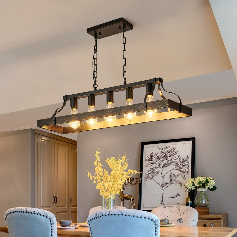 34-inch black and gold vintage chandelier with 5 lights, adjustable chain, illuminating a dining room with light blue chairs, wooden table, yellow flowers, and framed art