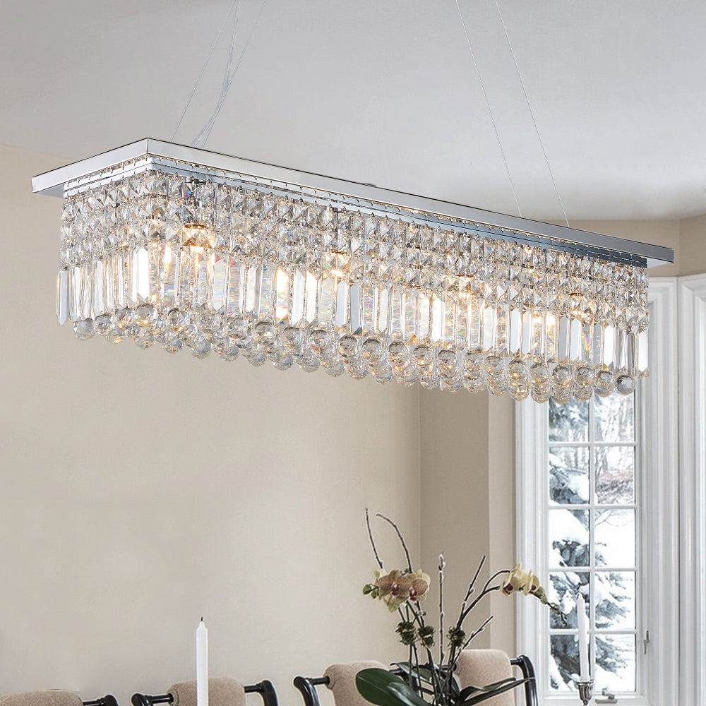 39.4-inch rectangular crystal raindrop chandelier installed in a dining room, featuring chrome finish and illuminated crystal drops creating an elegant ambiance.