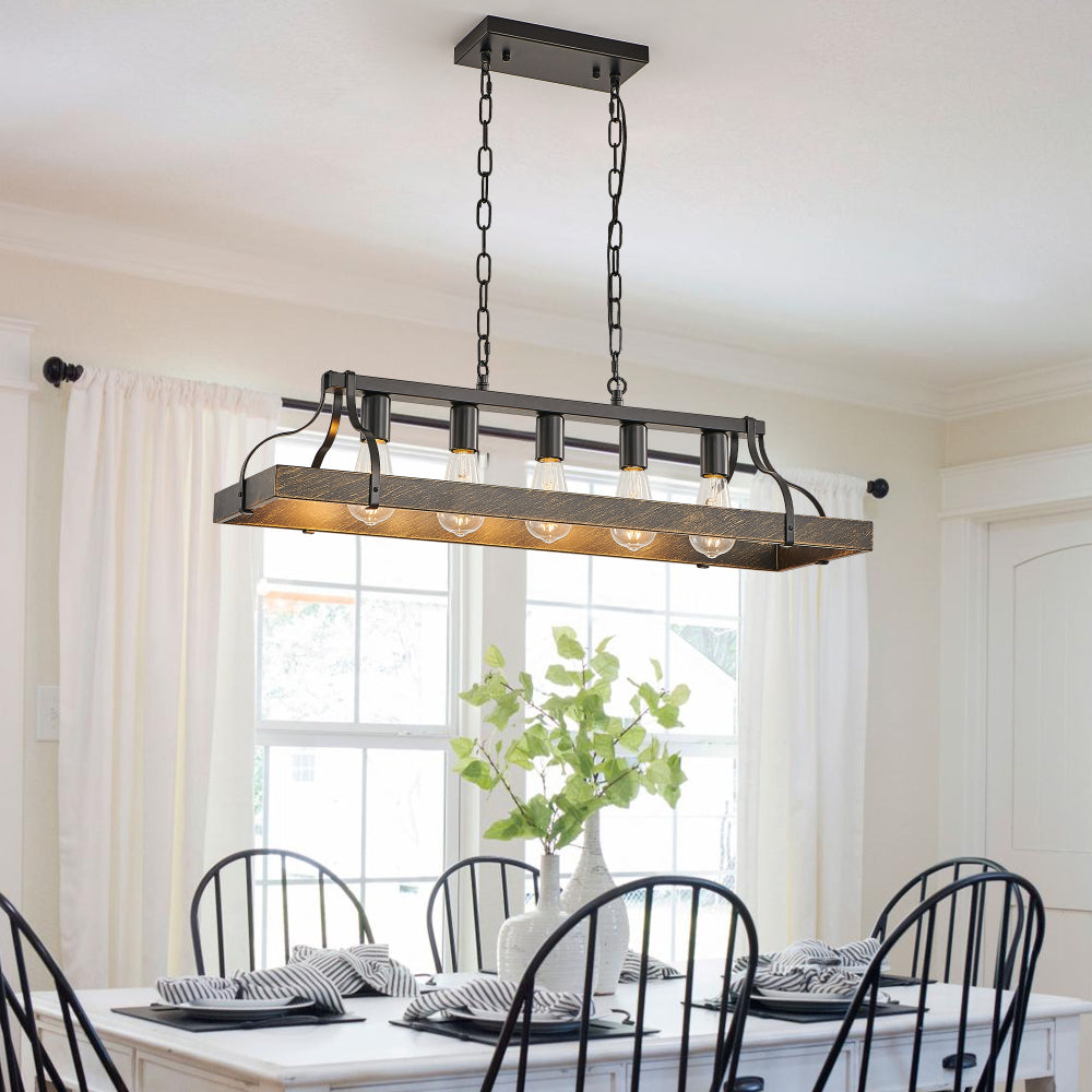 34-inch black and gold vintage 5-light chandelier with adjustable chain, hanging over a dining table with white curtains and greenery