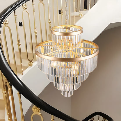 23.6" 5-tier K9 crystal chandelier with gold frame hanging in a staircase, showcasing its elegant design and crystal prisms.