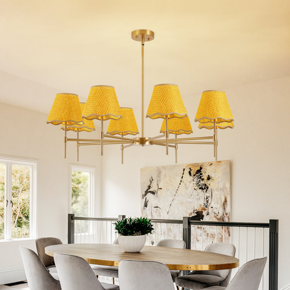 Gold Boho Rattan Chandelier with 8 yellow rattan lampshades hanging above a dining table in a bright, modern dining room.