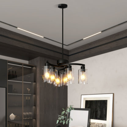 Black Modern Farmhouse 6-light chandelier with clear glass shades, warm light, installed in a stylish dining room with wooden cabinetry.