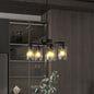 Black 6-light modern farmhouse chandelier with clear glass shades, adjustable height, dimmable, ideal for dining room and kitchen island.