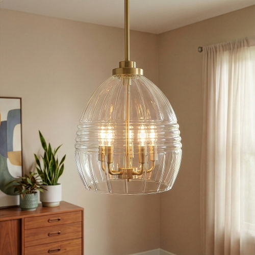 Pendant Chain Hanging Light with satin brass finish and ribbed clear glass shade, hanging in a bedroom with wooden dresser and potted plants.