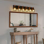 Industrial black metal cage wall sconce with wood accents, 6-light, 38-inch vintage fixture above mirror in hallway.