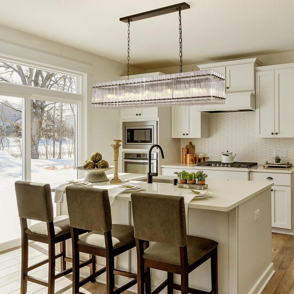 Rectangular Water Ripple Crystal Glass Chandelier with black frame, installed over a kitchen island with white cabinets and bar stools.