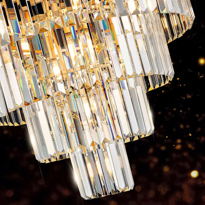 Close-up of K9 crystal prisms on 23.6" 5-tier chandelier, highlighting their sparkle and gold frame accents against dark background.