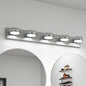 Modern chrome 5-light LED vanity light bar, 35 inches, mounted above an arched bathroom mirror with bright, even illumination