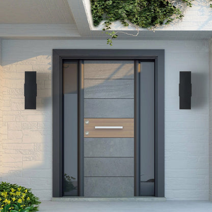 Two modern black outdoor wall sconces flanking modern front door with stone and wood panels, mounted on white brick wall.
