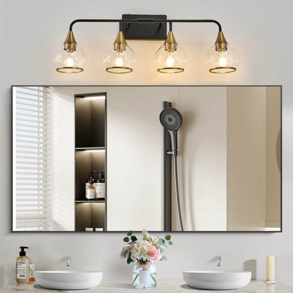 Black and gold 4-light industrial vanity wall sconce with clear glass shades, installed above double sink in modern bathroom