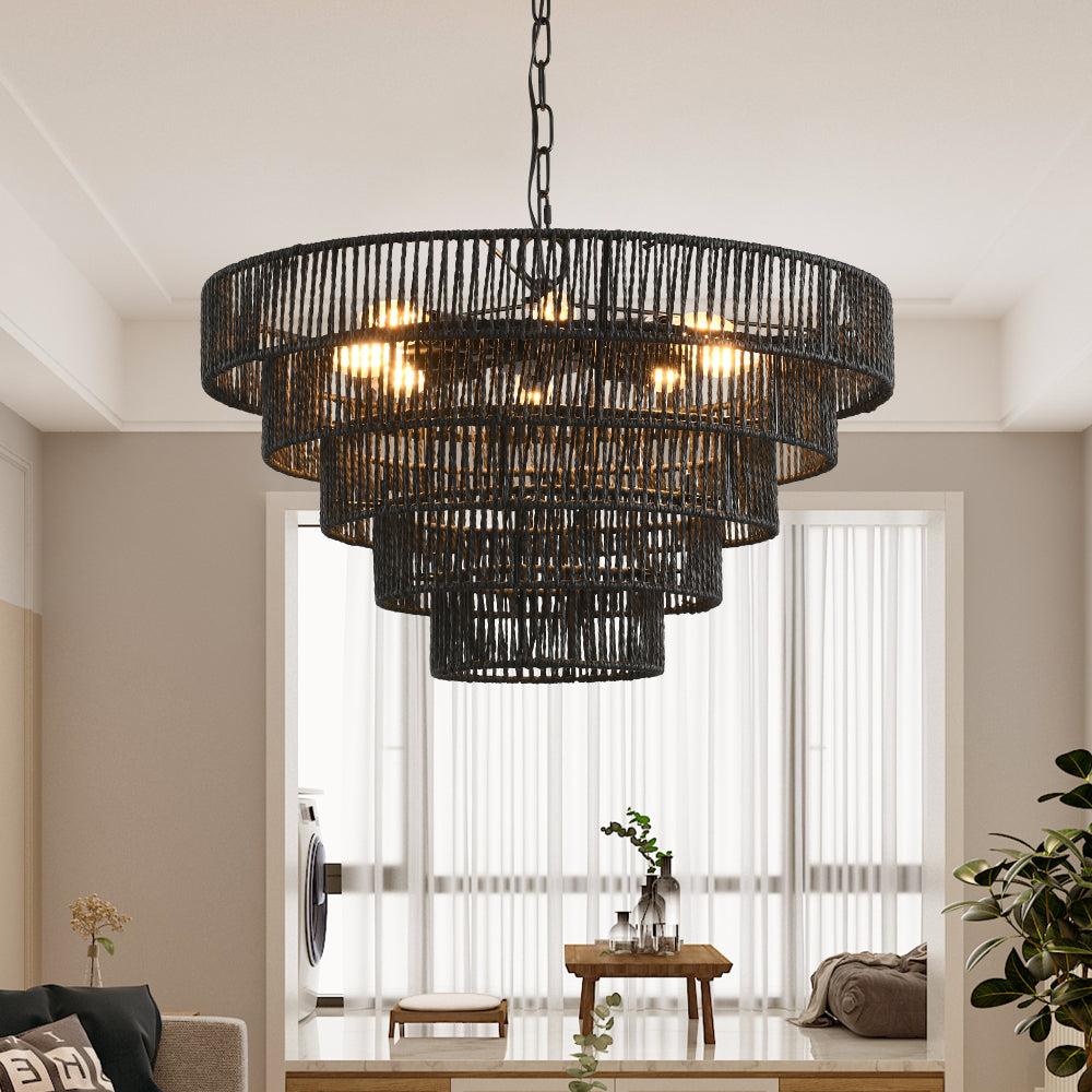 5-tier black hemp rope chandelier with lit E12 bulbs, hanging in a bright room with large windows and minimal decor.
