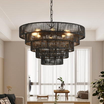5-tier black hemp rope chandelier with lit E12 bulbs, hanging in a bright room with large windows and minimal decor.