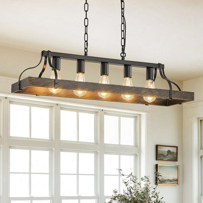 34-inch black and gold vintage 5-light chandelier with adjustable chain, hanging in a bright room with large windows and framed artwork