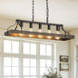 34-inch black and gold vintage 5-light chandelier with adjustable chain, hanging in a bright room with large windows and framed artwork